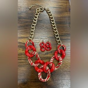 Chunky gold/red necklace/earrings set. Oval rings and chain. NWOT.